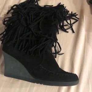 Minnetonka black fringe boots